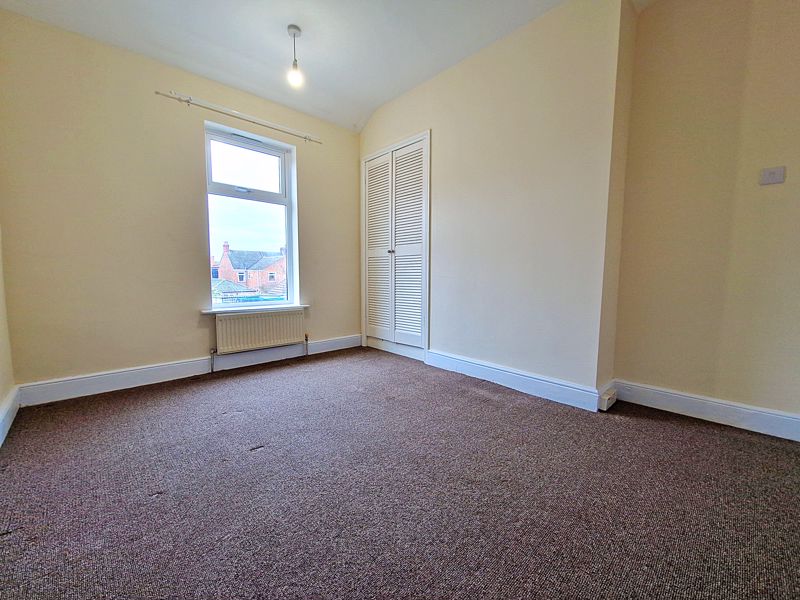 Rear bedroom- click for photo gallery